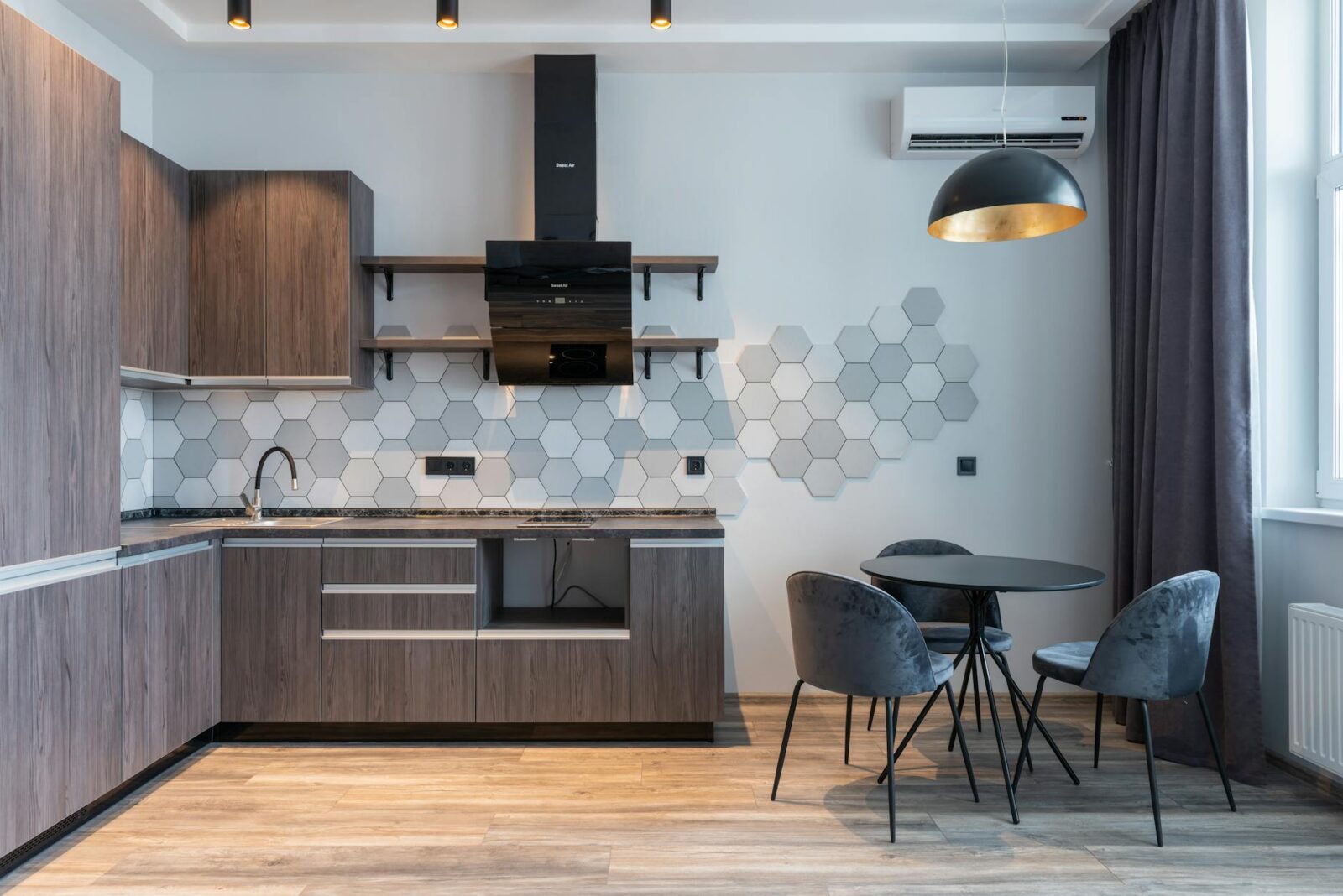 modern kitchen interior with furniture and lamp at home 7 Easy Home Upgrades to Enhance Your Listing