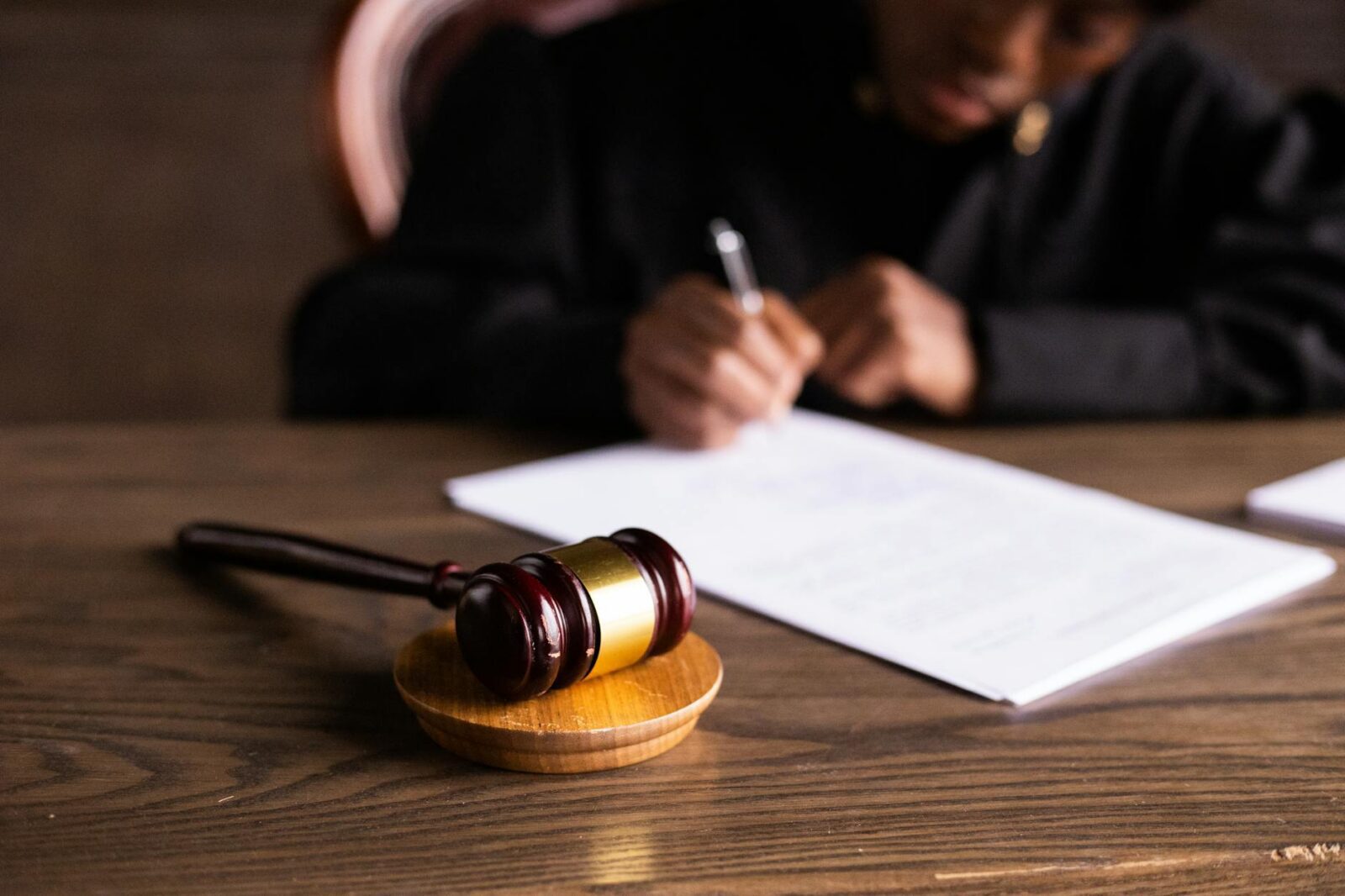 How to Handle a Landlord Dispute with Your Tenant 8 judge signing on the papers How to Handle a Landlord Dispute with Your Tenant