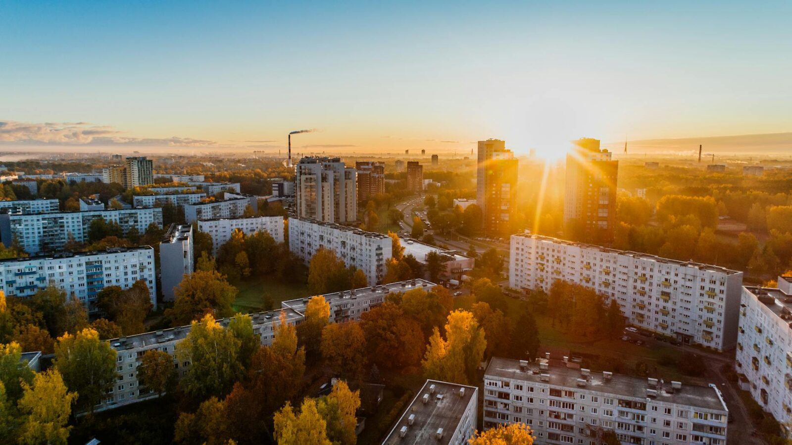 aerial view of white concrete buildings during golden hours Top Commercial Real Estate Investment Strategies: Upgrades That Maximize ROI