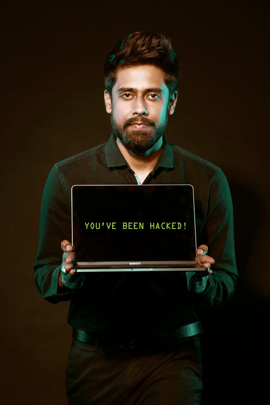 Why Email Security Still Gets Overlooked (And What To Fix Today) 10 man holding laptop computer with both hands Why Email Security Still Gets Overlooked (And What To Fix Today)