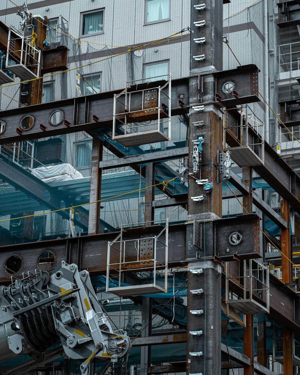 How to Become a Successful Real Estate Developer: 11 Essential Steps 11 metal beams in a construction site v