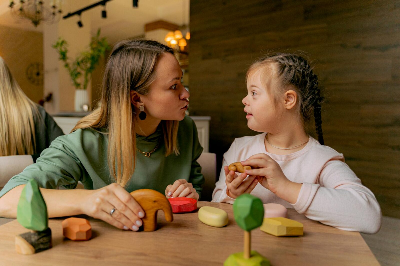 12 Essential Life Skills to Teach Your Kids (Beyond School Lessons) 14 a woman and girl playing together 12 Essential Life Skills to Teach Your Kids (Beyond School Lessons)