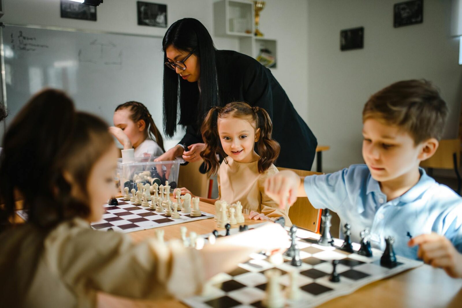 12 Essential Life Skills to Teach Your Kids (Beyond School Lessons) 7 kids playing chess 12 Essential Life Skills to Teach Your Kids (Beyond School Lessons)
